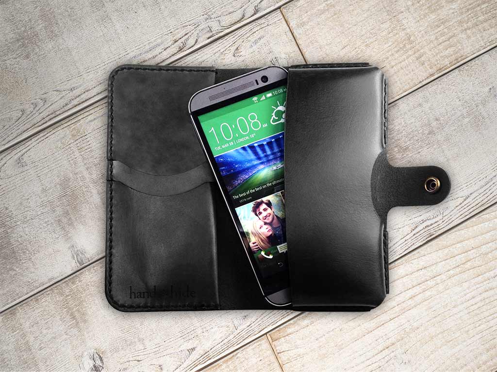 a cell phone sitting inside of a black case